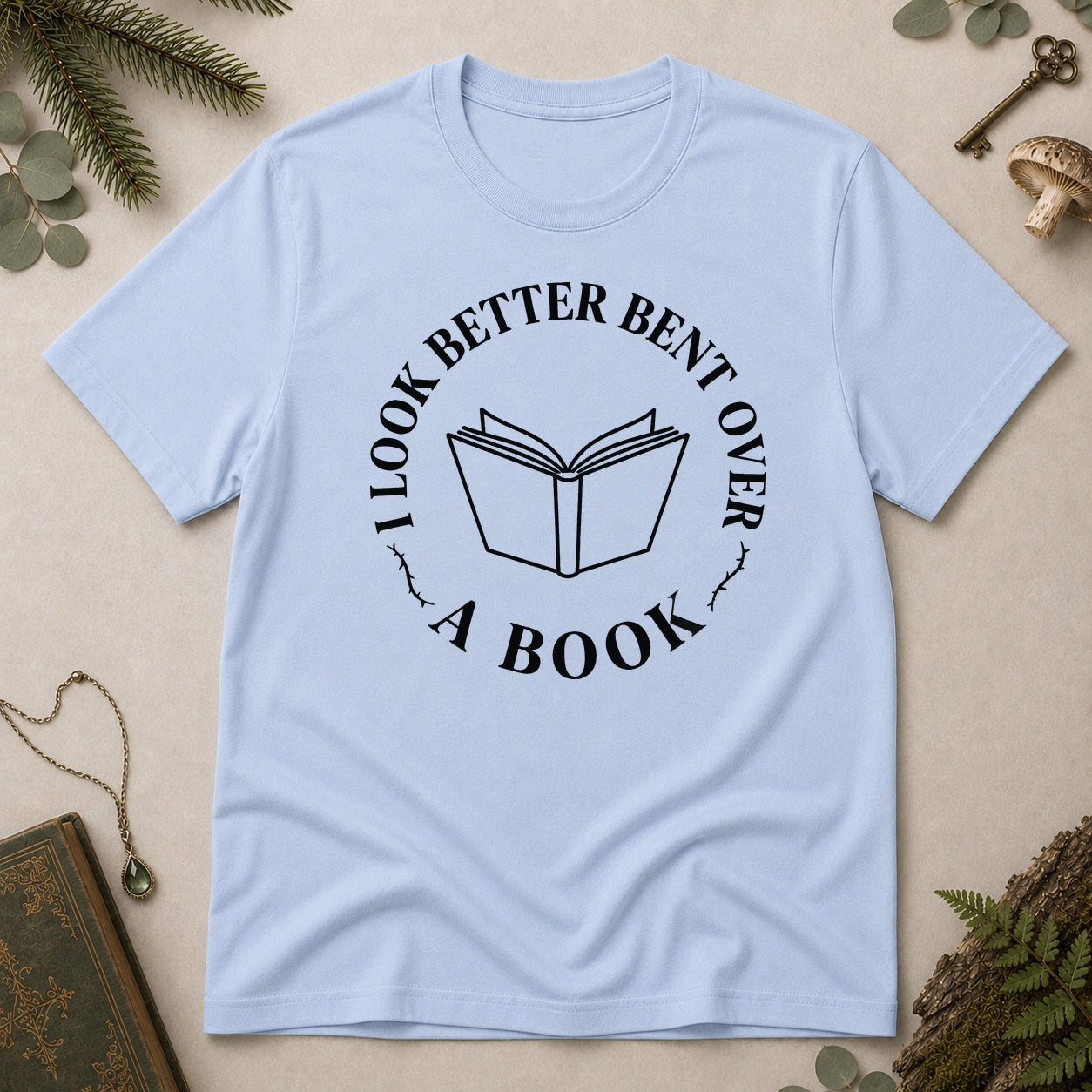 Bent Over a Book T-Shirt - Light Blue